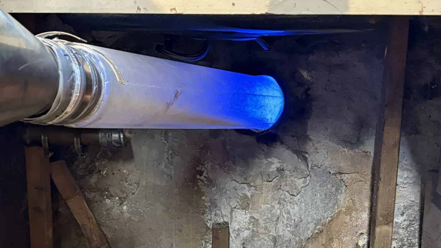 UV light curing a CIPP sewer pipe liner during a trenchless sewer pipe lining installation in Massachusetts