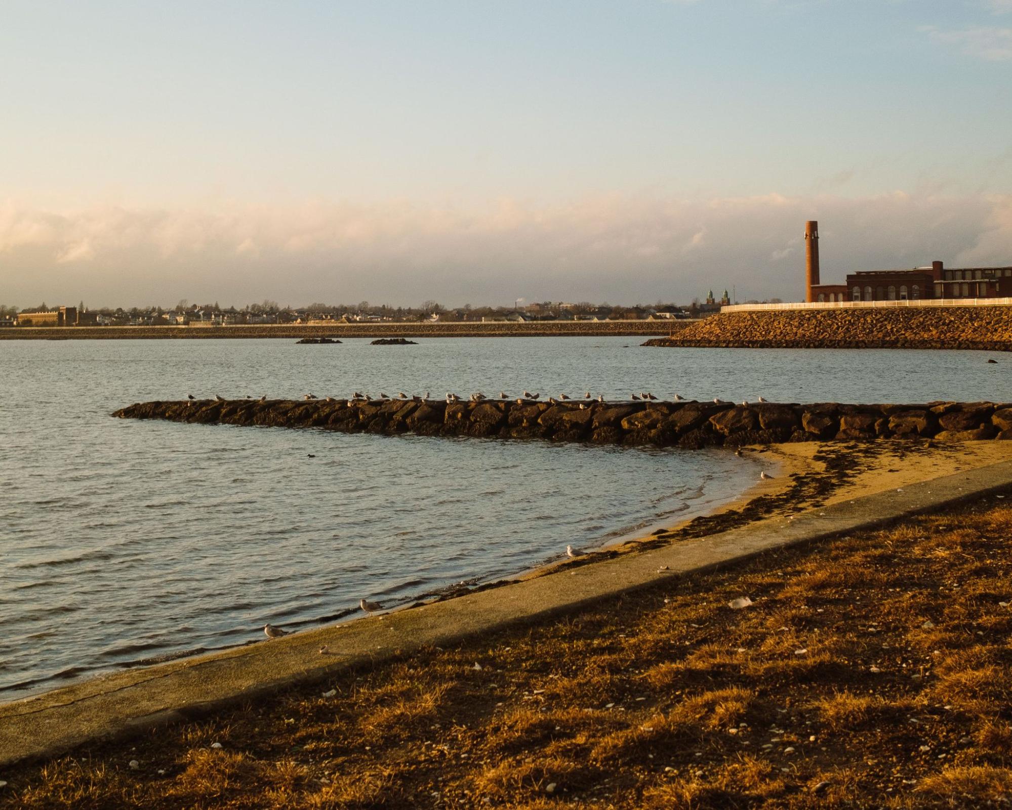 New Bedford, MA waterfront and historic mill, served by TID Trenchless for trenchless sewer repair.